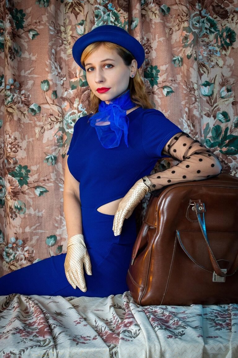 young woman, fabrics, patterns, woman, retro, vintage, portrait, fashion, style, blue, hat, scarf, gloves, pose, hands, a bag, travel bag, portfolio, suitcase